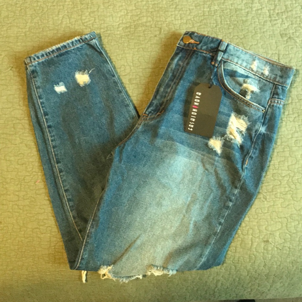 Fashion Nova jeans size 13. Medium wash ripped